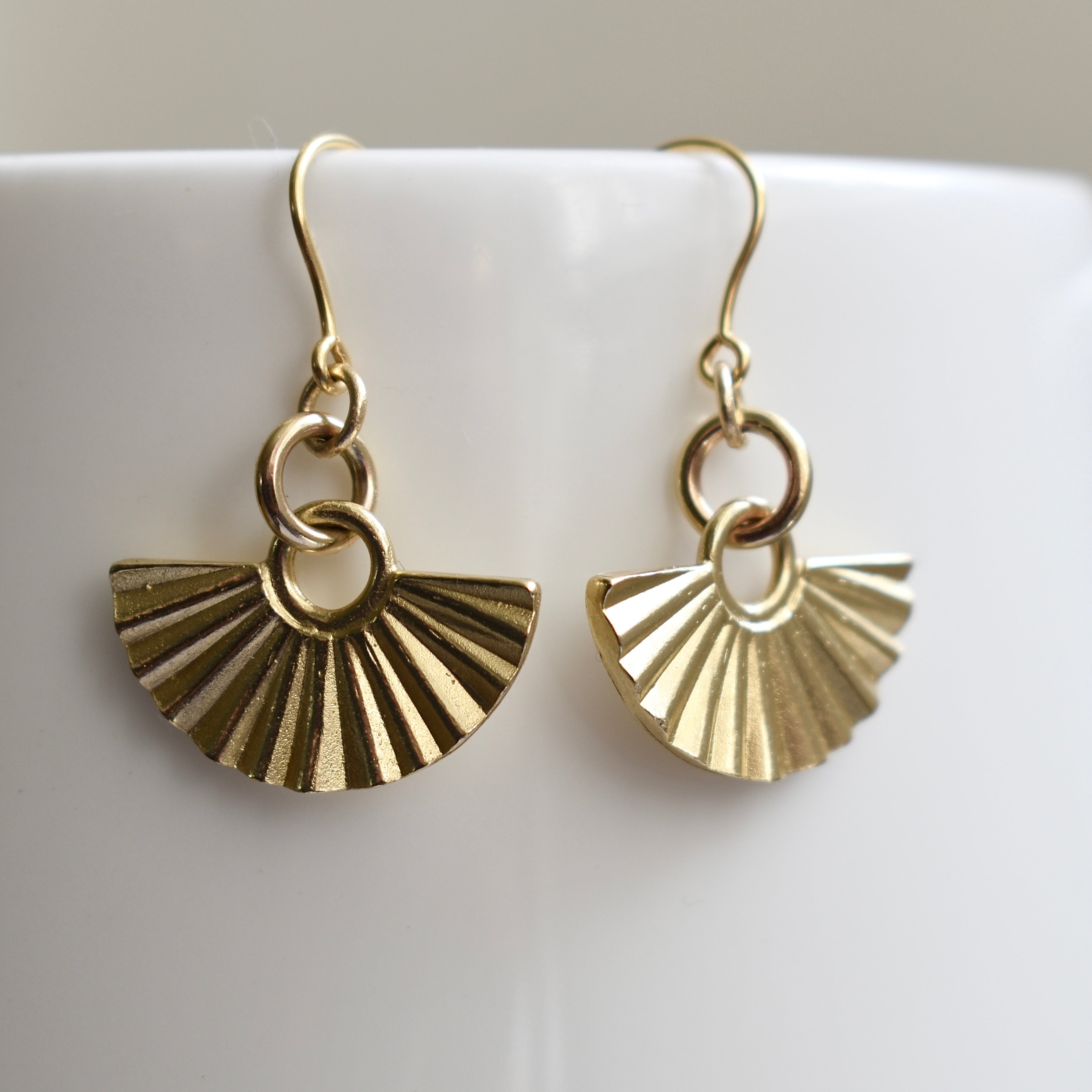 Gold hot sale fan earrings